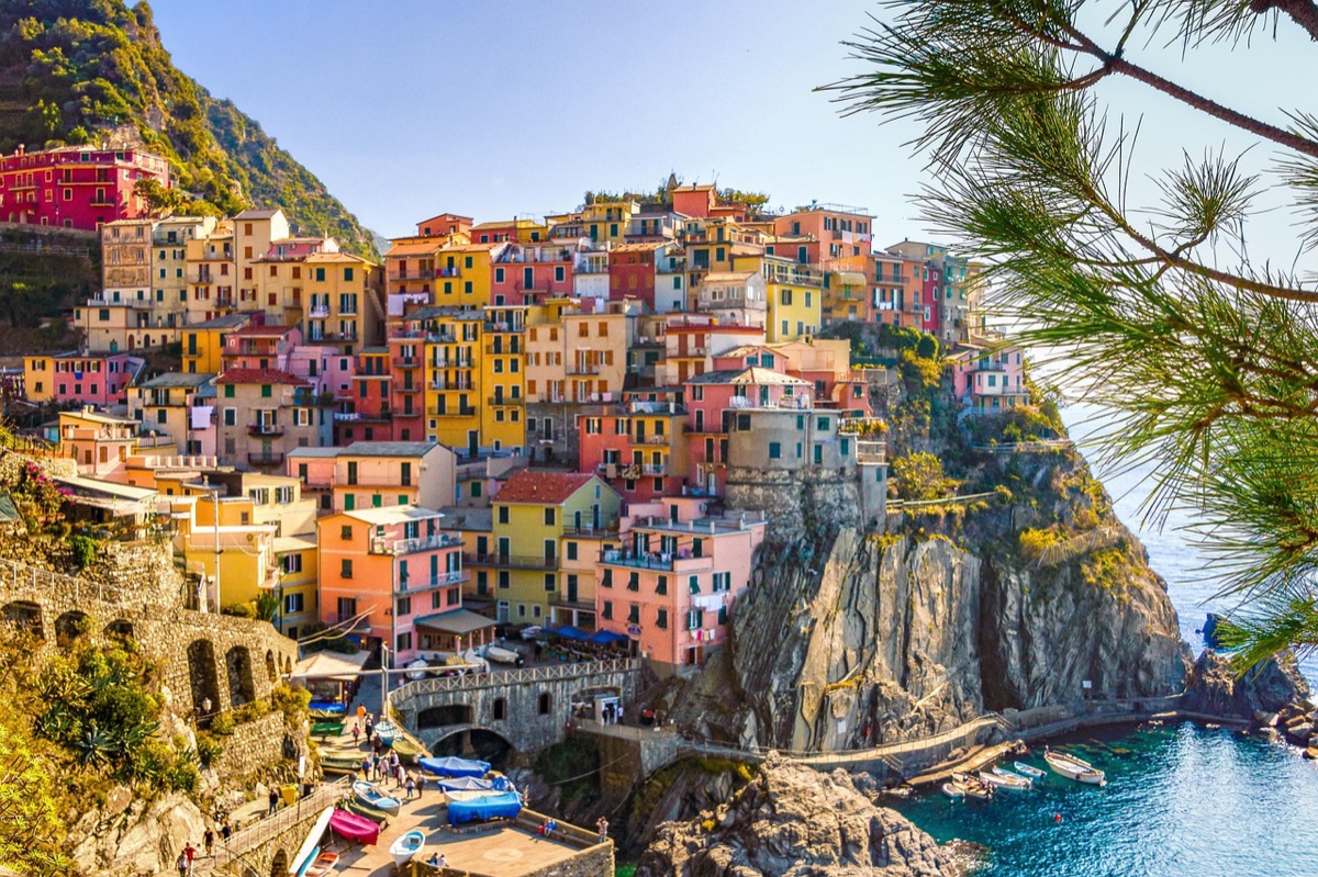 Ia Village from Cliff: Panoramic View of White Buildings and Blue Sea