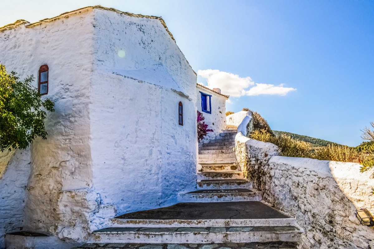 Greek island with white houses and blue sea