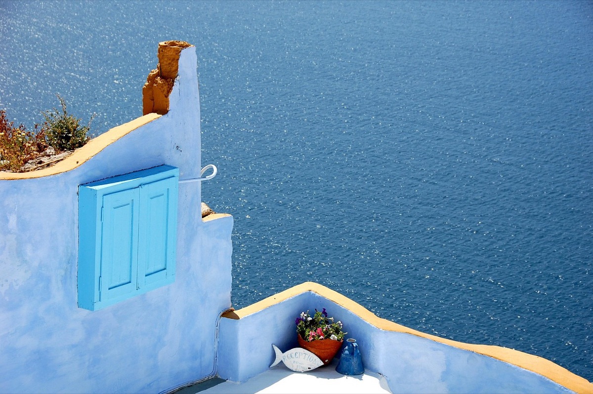 Sunset com restaurante em Santorini