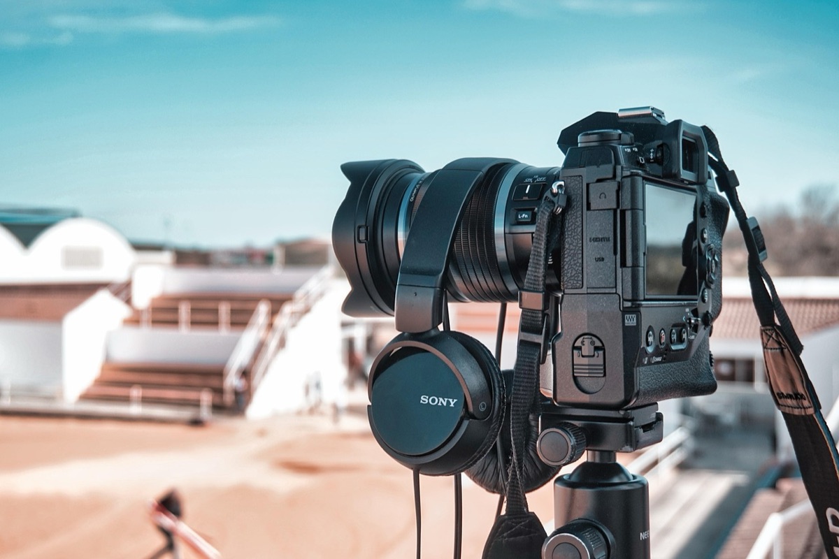 Santorini beach with camera lens cap
